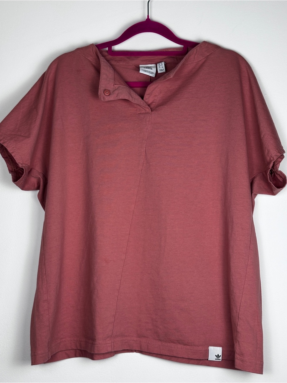 adidas Womenโs Button-Detail Short Sleeve Tee in Rose